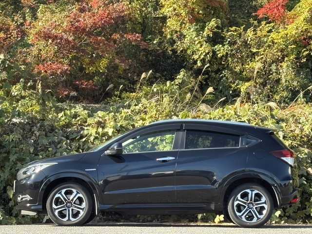 ホンダ ヴェゼル ハイブリッド Z 大分県 2015(平27)年 10.3万km クリスタルブラックパール ワンオーナー /あんしんパッケージ/ハーフレザーシート/シートヒーター/社外メモリーナビ/バックカメラ/フルセグ /DVD/Bluetooth/前後ドライブレコーダー/クルーズコントロール/純正17インチアルミホイール/スマートキー/エンジンプッシュスタート/純正LEDヘッドライト/オートライトコントロール/パドルシフト