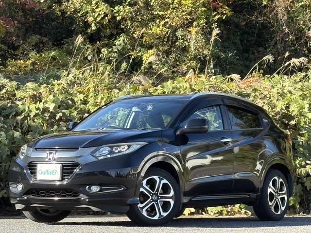 ホンダ ヴェゼル ハイブリッド Z 大分県 2015(平27)年 10.3万km クリスタルブラックパール ワンオーナー /あんしんパッケージ/ハーフレザーシート/シートヒーター/社外メモリーナビ/バックカメラ/フルセグ /DVD/Bluetooth/前後ドライブレコーダー/クルーズコントロール/純正17インチアルミホイール/スマートキー/エンジンプッシュスタート/純正LEDヘッドライト/オートライトコントロール/パドルシフト