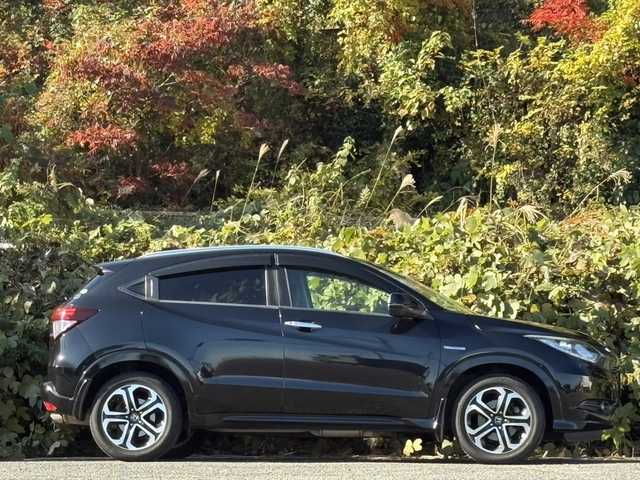 ホンダ ヴェゼル ハイブリッド Z 大分県 2015(平27)年 10.3万km クリスタルブラックパール ワンオーナー /あんしんパッケージ/ハーフレザーシート/シートヒーター/社外メモリーナビ/バックカメラ/フルセグ /DVD/Bluetooth/前後ドライブレコーダー/クルーズコントロール/純正17インチアルミホイール/スマートキー/エンジンプッシュスタート/純正LEDヘッドライト/オートライトコントロール/パドルシフト
