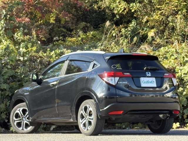 ホンダ ヴェゼル ハイブリッド Z 大分県 2015(平27)年 10.3万km クリスタルブラックパール ワンオーナー /あんしんパッケージ/ハーフレザーシート/シートヒーター/社外メモリーナビ/バックカメラ/フルセグ /DVD/Bluetooth/前後ドライブレコーダー/クルーズコントロール/純正17インチアルミホイール/スマートキー/エンジンプッシュスタート/純正LEDヘッドライト/オートライトコントロール/パドルシフト