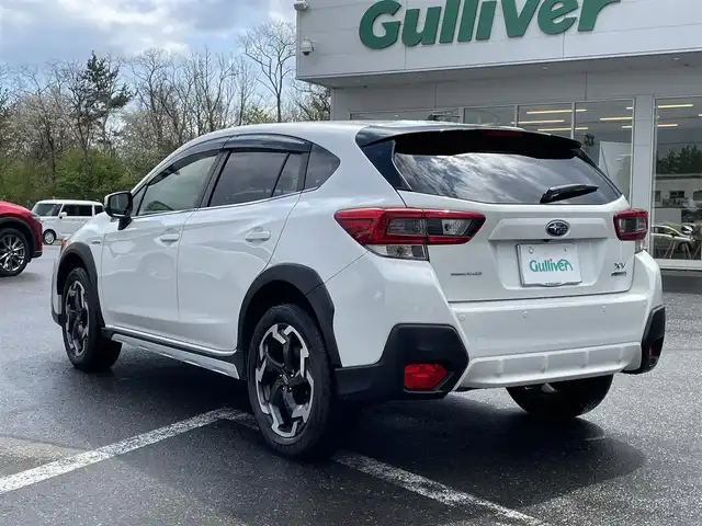 スバル ＸＶ ハイブリッド アドバンス 青森県 2021(令3)年 2.4万km クリスタルホワイトP 4WD/ディーラーオプションナビ/フルセグTV/CD/DVD/BT/ETC2.0/純正ドライブレコーダー/D/N席パワーシート/D席シートメモリ/ハーフレザーシート/本革巻きステアリング/電動パーキングブレーキ/LEDオートライト/フォグランプ/ステアリング連動ヘッドランプ/アイサイトVer3.0/社外17インチホイール付きスタッドレスタイヤ積込