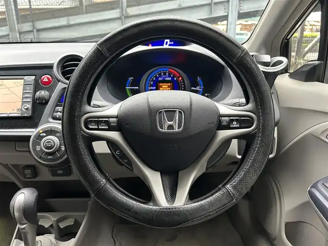 ホンダ インサイト G 静岡県 2009(平21)年 14.3万km アラバスターシルバーメタリック HDDナビ/エコアシスト/プロジェクタータイプハロゲンヘッドライト/テレスコピック&チルトステアリング/ヒルスタートアシスト機能/キーレスエントリー/バックカメラ/純正フロアマット/盗難防止装置/DVD再生/マルチインフォメーションディスプレイ