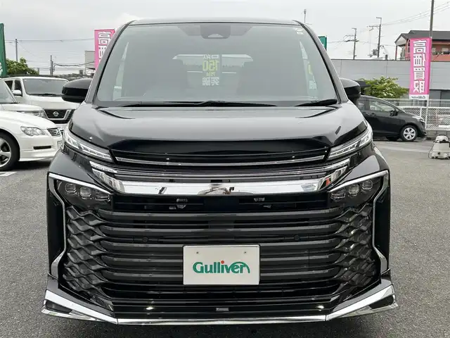 トヨタ ヴォクシー S－Z 奈良県 2023(令5)年 1.2万km アティチュードブラックマイカ オーナー/モデリスタエアロ/純正ナビ（ＣＤ／ＢＴ／ＵＳＢ／フルセグ）/衝突軽減システム/レーンキープアシスト/レーダークルーズコントロール/オートハイビーム/パーキングサポートブレーキ/両パワスラ/クリアランスソナー/ハーフレザー/前席シートヒーター/ETC2.0/バックカメラ/サンシェード/ドアバイザー/横滑り防止/純正17インチAw