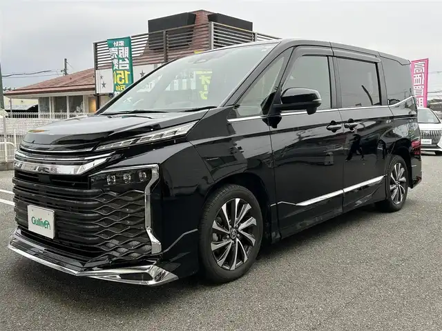 トヨタ ヴォクシー S－Z 奈良県 2023(令5)年 1.2万km アティチュードブラックマイカ オーナー/モデリスタエアロ/純正ナビ（ＣＤ／ＢＴ／ＵＳＢ／フルセグ）/衝突軽減システム/レーンキープアシスト/レーダークルーズコントロール/オートハイビーム/パーキングサポートブレーキ/両パワスラ/クリアランスソナー/ハーフレザー/前席シートヒーター/ETC2.0/バックカメラ/サンシェード/ドアバイザー/横滑り防止/純正17インチAw
