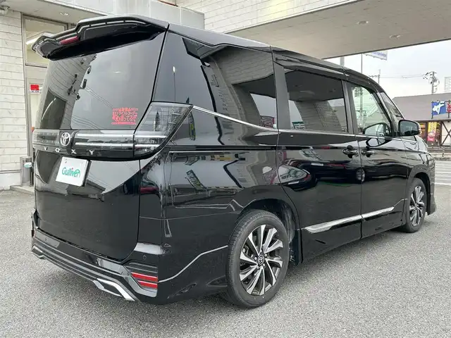 トヨタ ヴォクシー S－Z 奈良県 2023(令5)年 1.2万km アティチュードブラックマイカ オーナー/モデリスタエアロ/純正ナビ（ＣＤ／ＢＴ／ＵＳＢ／フルセグ）/衝突軽減システム/レーンキープアシスト/レーダークルーズコントロール/オートハイビーム/パーキングサポートブレーキ/両パワスラ/クリアランスソナー/ハーフレザー/前席シートヒーター/ETC2.0/バックカメラ/サンシェード/ドアバイザー/横滑り防止/純正17インチAw
