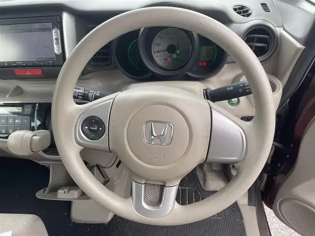 ホンダ Ｎ ＢＯＸ G Lパッケージ 長崎県 2012(平24)年 7.4万km プレミアムディープロッソパール 純正Ｇａｔｈｅｒｓメモリナビゲーション/・ワンセグＴＶ/・FM/AMラジオ/・Bluetooth/・CD/左側パワースライドドア/ETC/プッシュスタート/保証書/取扱説明書