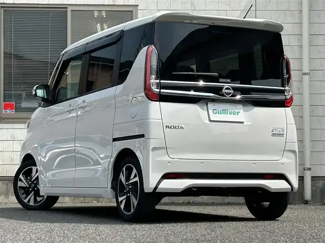 日産 ルークス HWS Gターボ プロパイロットED 福岡県 2024(令6)年 0.4万km プレミアムサンシャインオレンジメタリック/シルキーホワイト ワンオーナー/純正8インチメモリナビ/　（AM/FM/Bluetooth/フルセグTV）/フロント/サイド/バックカメラ/アラウンドビューモニター/インテリジェンスモビリティ/・プロパイロット/・インテリジェントエマージェンシーブレーキ/・前方衝突予測警報/・踏み間違い衝突防止アシスト/・車線逸脱警報/・車線逸脱防止支援システム/・ふらつき警報/・標識検知機能/・先行車発進お知らせ/コーナーセンサー/クリアランスソナー/オートライト/オートドア/純正15インチアルミホイール/黒色レザー調シートカバー/両側パワースライドドア/前方ドライブレコーダー/室内カメラ/純正フロアマット/社外ワイドインナーミラー/ISOFIX/プッシュスタート/ドアバイザー/電格ウインカーミラー/電源ソケット×1/スペアキー×1 /保証書/取扱説明書