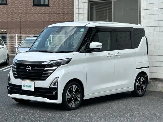 日産 ルークス HWS Gターボ プロパイロットED 福岡県 2024(令6)年 0.4万km プレミアムサンシャインオレンジメタリック/シルキーホワイト ワンオーナー/純正8インチメモリナビ/　（AM/FM/Bluetooth/フルセグTV）/フロント/サイド/バックカメラ/アラウンドビューモニター/インテリジェンスモビリティ/・プロパイロット/・インテリジェントエマージェンシーブレーキ/・前方衝突予測警報/・踏み間違い衝突防止アシスト/・車線逸脱警報/・車線逸脱防止支援システム/・ふらつき警報/・標識検知機能/・先行車発進お知らせ/コーナーセンサー/クリアランスソナー/オートライト/オートドア/純正15インチアルミホイール/黒色レザー調シートカバー/両側パワースライドドア/前方ドライブレコーダー/室内カメラ/純正フロアマット/社外ワイドインナーミラー/ISOFIX/プッシュスタート/ドアバイザー/電格ウインカーミラー/電源ソケット×1/スペアキー×1 /保証書/取扱説明書