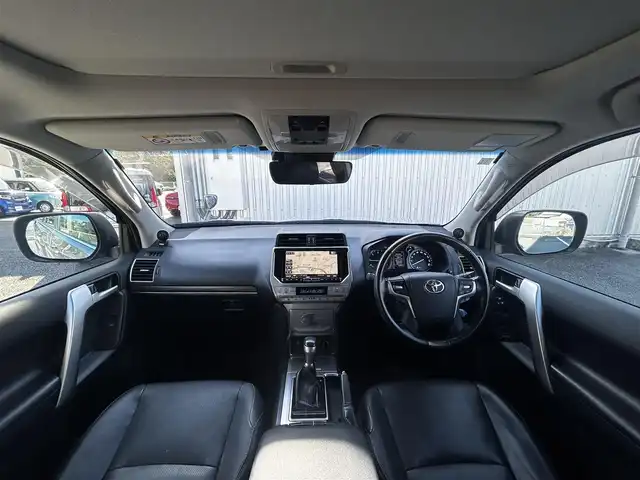 トヨタ ランドクルーザー プラド TX Lパッケージ 静岡県 2018(平30)年 5.4万km アバンギャルドブロンズメタリック ユーザー買取車両/ワンオーナー/ALPINE製9インチSDナビ(X9Z)/　【CD/DVD/BT/地デジフルセグTV】/純正LEDヘッドライト/社外17インチAW/レザーシート/シートヒーター/ベンチレーション/ウッドコンビステアリング/バックカメラ/ETC/ルーフレール/プリクラッシュセーフティシステム/レーンキープアシスト/サンルーフ/電動格納サードシート/スマートキー/新車時保証書/取扱説明書/スペアキー×1