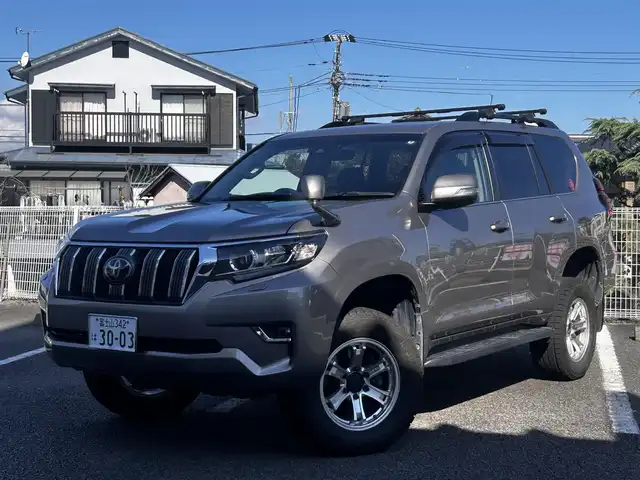 トヨタ ランドクルーザー プラド TX Lパッケージ 静岡県 2018(平30)年 5.4万km アバンギャルドブロンズメタリック ユーザー買取車両/ワンオーナー/ALPINE製9インチSDナビ(X9Z)/　【CD/DVD/BT/地デジフルセグTV】/純正LEDヘッドライト/社外17インチAW/レザーシート/シートヒーター/ベンチレーション/ウッドコンビステアリング/バックカメラ/ETC/ルーフレール/プリクラッシュセーフティシステム/レーンキープアシスト/サンルーフ/電動格納サードシート/スマートキー/新車時保証書/取扱説明書/スペアキー×1