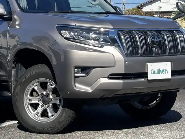 トヨタ ランドクルーザー プラド TX Lパッケージ 静岡県 2018(平30)年 5.4万km アバンギャルドブロンズメタリック ユーザー買取車両/ワンオーナー/ALPINE製9インチSDナビ(X9Z)/　【CD/DVD/BT/地デジフルセグTV】/純正LEDヘッドライト/社外17インチAW/レザーシート/シートヒーター/ベンチレーション/ウッドコンビステアリング/バックカメラ/ETC/ルーフレール/プリクラッシュセーフティシステム/レーンキープアシスト/サンルーフ/電動格納サードシート/スマートキー/新車時保証書/取扱説明書/スペアキー×1