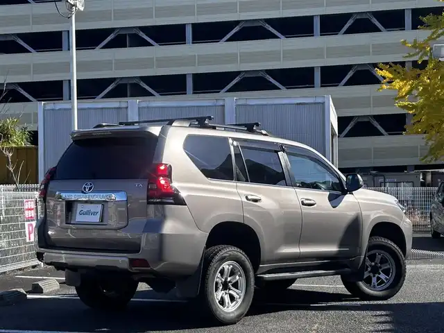 トヨタ ランドクルーザー プラド TX Lパッケージ 静岡県 2018(平30)年 5.4万km アバンギャルドブロンズメタリック ユーザー買取車両/ワンオーナー/ALPINE製9インチSDナビ(X9Z)/　【CD/DVD/BT/地デジフルセグTV】/純正LEDヘッドライト/社外17インチAW/レザーシート/シートヒーター/ベンチレーション/ウッドコンビステアリング/バックカメラ/ETC/ルーフレール/プリクラッシュセーフティシステム/レーンキープアシスト/サンルーフ/電動格納サードシート/スマートキー/新車時保証書/取扱説明書/スペアキー×1