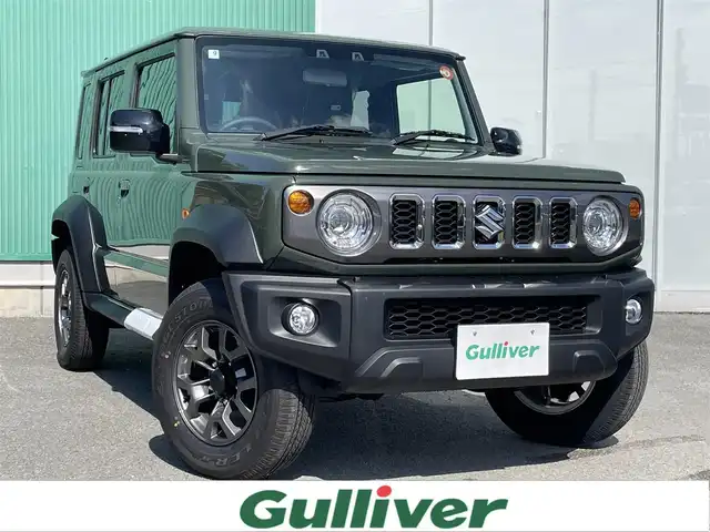 スズキ ジムニー ノマド FC 福岡県 2025(令7)年 0.1千km 緑 登録済未使用車/4WD/レーダークルーズコントロール/LEDヘッドライト/オートライト/DN席シートヒーター/純正15インチAW/アイドリングストップ/横滑り防止装置/コーナーセンサー/レーンキープアシスト/盗難防止装置/衝突被害軽減ブレーキ/スマートキー