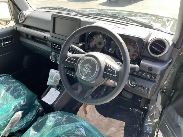 スズキ ジムニー ノマド FC 福岡県 2025(令7)年 0.1千km 緑 登録済未使用車/4WD/レーダークルーズコントロール/LEDヘッドライト/オートライト/DN席シートヒーター/純正15インチAW/アイドリングストップ/横滑り防止装置/コーナーセンサー/レーンキープアシスト/盗難防止装置/衝突被害軽減ブレーキ/スマートキー