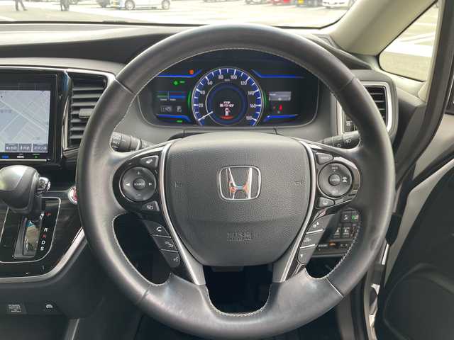 ホンダ オデッセイ ハイブリッド アブソルート・EXホンダセンジング 愛知県 2019(平31)年 9.1万km プラチナホワイトパール ホンダセンシング/純正10型ナビ/フリップダウンモニター/全方位カメラ/レーダークルーズコントロール/シートヒーター/バックカメラ/パワーシート/コーナーセンサー/純正アルミホイール/ETC2.0/ブラインドスポットモニター/LEDヘッドライト/レーンキープアシスト/ドライブレコーダー/ステアリングスイッチ/スマートキー/プッシュスタート/プレミアムシート