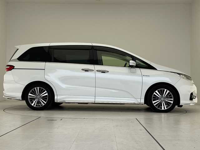 ホンダ オデッセイ ハイブリッド アブソルート・EXホンダセンジング 愛知県 2019(平31)年 9.1万km プラチナホワイトパール ホンダセンシング/純正10型ナビ/フリップダウンモニター/全方位カメラ/レーダークルーズコントロール/シートヒーター/バックカメラ/パワーシート/コーナーセンサー/純正アルミホイール/ETC2.0/ブラインドスポットモニター/LEDヘッドライト/レーンキープアシスト/ドライブレコーダー/ステアリングスイッチ/スマートキー/プッシュスタート/プレミアムシート