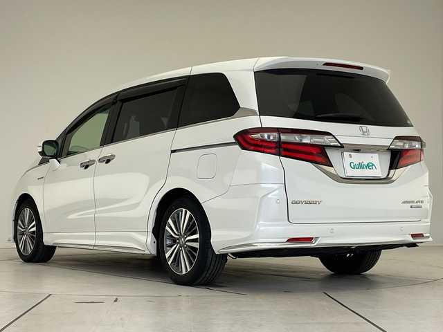 ホンダ オデッセイ ハイブリッド アブソルート・EXホンダセンジング 愛知県 2019(平31)年 9.1万km プラチナホワイトパール ホンダセンシング/純正10型ナビ/フリップダウンモニター/全方位カメラ/レーダークルーズコントロール/シートヒーター/バックカメラ/パワーシート/コーナーセンサー/純正アルミホイール/ETC2.0/ブラインドスポットモニター/LEDヘッドライト/レーンキープアシスト/ドライブレコーダー/ステアリングスイッチ/スマートキー/プッシュスタート/プレミアムシート