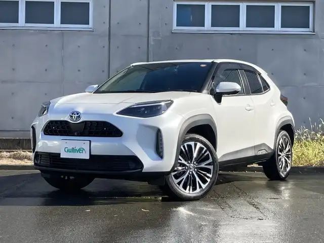 トヨタ ヤリスクロス ハイブリッド Z 静岡県 2022(令4)年 5.6万km プラチナホワイトパールマイカ ワンオーナー/純正ディズプレイオーディオ/Bluetooth　Apple CarPlay　AM FM/全方位カメラ/前後ドライブレコーダー/ビルトインETC2.0/レーダークルーズコントロール/D N席シートヒーター/ステアリングヒーター/オートハイビーム/LEDヘッドライト/ブラインドスポットモニター/純正18インチアルミホイール/スペアキーあり/プッシュスタート/純正フロアマット/取説保証書あり