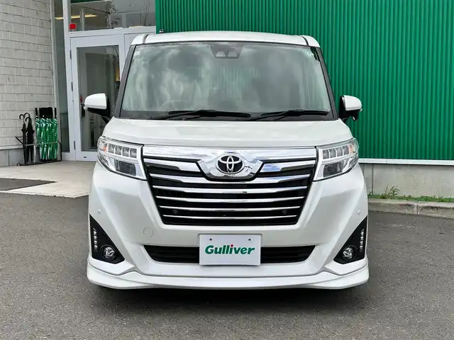 トヨタ ルーミー カスタムG－T 宮城県 2019(平31)年 6.8万km パールホワイトⅢ コンフォートパッケージ/・シートヒーター（運転席/助手席）/・シートバックテーブル（運転席/助手席）/＝＝＝/スマートアシスト3/・衝突回避支援ブレーキ機能/・衝突警報機能/・車線逸脱警報機能/・誤発進抑制制御機能/・先行車発進お知らせ機能/・オートハイビーム/・コーナーセンサー/社外ナビ（AVIC-RZ901）/・CD/DVD/・Bluetooth/・フルセグTV/バックカメラ/ETC/両側パワースライドドア/革巻きステアリング/クルーズコントロール/LEDヘッドランプ/フォグランプ/オートライト/スマートキー＆プッシュスタート/スペアキー/エンジンスターター/電動格納ミラー/純正15インチAW/純正ドアバイザー/純正フロアマット/Wエアバッグ