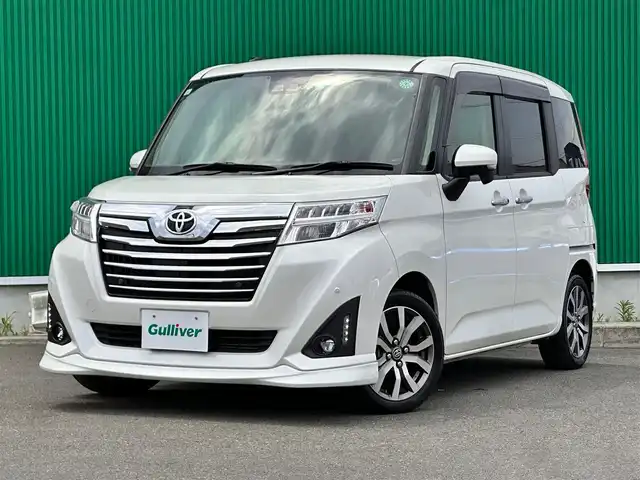 トヨタ ルーミー カスタムG－T 宮城県 2019(平31)年 6.8万km パールホワイトⅢ コンフォートパッケージ/・シートヒーター（運転席/助手席）/・シートバックテーブル（運転席/助手席）/＝＝＝/スマートアシスト3/・衝突回避支援ブレーキ機能/・衝突警報機能/・車線逸脱警報機能/・誤発進抑制制御機能/・先行車発進お知らせ機能/・オートハイビーム/・コーナーセンサー/社外ナビ（AVIC-RZ901）/・CD/DVD/・Bluetooth/・フルセグTV/バックカメラ/ETC/両側パワースライドドア/革巻きステアリング/クルーズコントロール/LEDヘッドランプ/フォグランプ/オートライト/スマートキー＆プッシュスタート/スペアキー/エンジンスターター/電動格納ミラー/純正15インチAW/純正ドアバイザー/純正フロアマット/Wエアバッグ