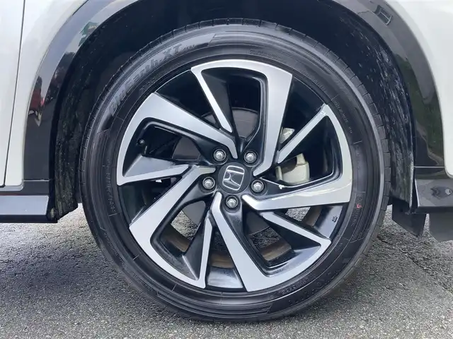 ホンダ ヴェゼル ハイブリッド RS ホンダセンシング 静岡県 2019(平31)年 3.5万km プラチナホワイトパール HondaSENSING/社外7インチナビ(MDV-M705)/　AM FM CD DVD Bluetooth USB SD/ビルトインETC/レーダークルーズコントロール/LEDオートヘッドランプ/ハーフレザーシート/シートヒーター/オートブレーキホールド/スマートキー2本/純正18インチアルミホイール/パドルシフト/フルセグTV/バックモニター/前後方ドライブレコーダー