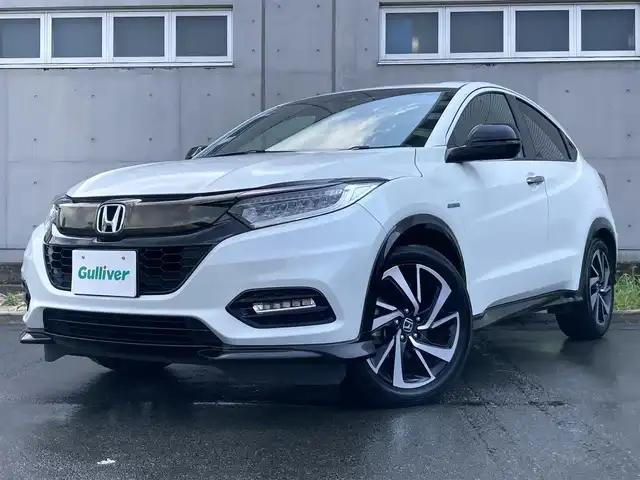 ホンダ ヴェゼル ハイブリッド RS ホンダセンシング 静岡県 2019(平31)年 3.5万km プラチナホワイトパール HondaSENSING/社外7インチナビ(MDV-M705)/　AM FM CD DVD Bluetooth USB SD/ビルトインETC/レーダークルーズコントロール/LEDオートヘッドランプ/ハーフレザーシート/シートヒーター/オートブレーキホールド/スマートキー2本/純正18インチアルミホイール/パドルシフト/フルセグTV/バックモニター/前後方ドライブレコーダー
