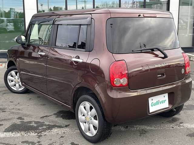 スズキ ラパン 10thアニバーサリーリミテッド 道東・釧路十勝 2012(平24)年 10.1万km マルーンブラウンパール ・4WD/・純正CDオーディオ/(CD・FM・AM・ラジオ】/・運転席シートヒーター/・純正フロアマット/・ドアバイザー/・スマートキー/・プッシュスタート/・純正14インチアルミホイール