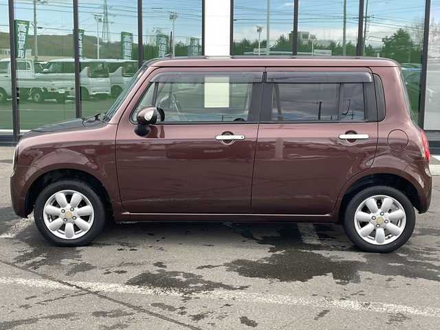 スズキ ラパン 10thアニバーサリーリミテッド 道東・釧路十勝 2012(平24)年 10.1万km マルーンブラウンパール ・4WD/・純正CDオーディオ/(CD・FM・AM・ラジオ】/・運転席シートヒーター/・純正フロアマット/・ドアバイザー/・スマートキー/・プッシュスタート/・純正14インチアルミホイール