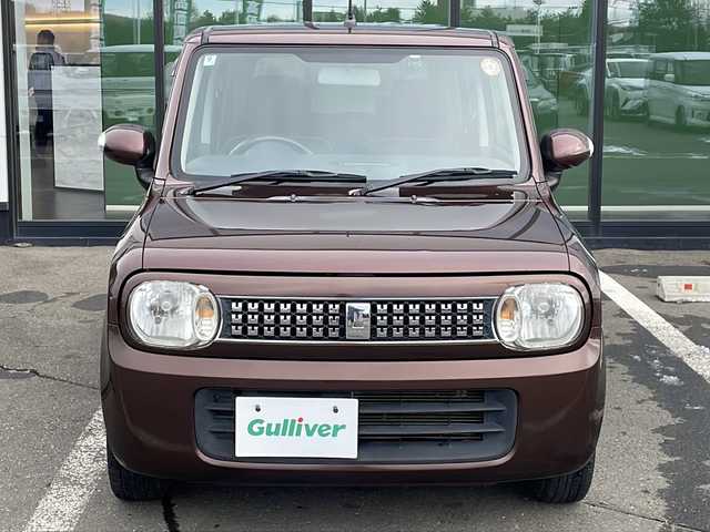 スズキ ラパン 10thアニバーサリーリミテッド 道東・釧路十勝 2012(平24)年 10.1万km マルーンブラウンパール ・4WD/・純正CDオーディオ/(CD・FM・AM・ラジオ】/・運転席シートヒーター/・純正フロアマット/・ドアバイザー/・スマートキー/・プッシュスタート/・純正14インチアルミホイール