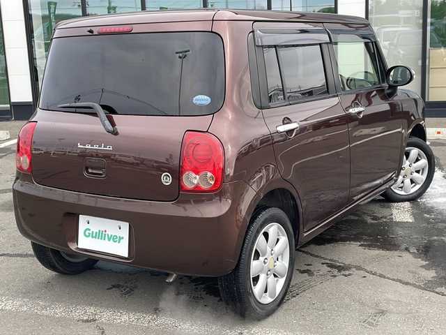 スズキ ラパン 10thアニバーサリーリミテッド 道東・釧路十勝 2012(平24)年 10.1万km マルーンブラウンパール ・4WD/・純正CDオーディオ/(CD・FM・AM・ラジオ】/・運転席シートヒーター/・純正フロアマット/・ドアバイザー/・スマートキー/・プッシュスタート/・純正14インチアルミホイール