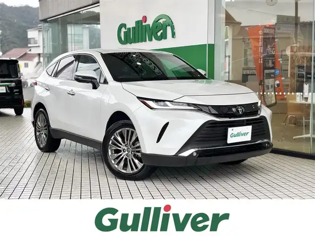 トヨタ ハリアー Z 京都府 2024(令6)年 1万km プラチナホワイトパールマイカ トヨタセーフティセンス/・プリクラッシュセーフティ/・レーダークルーズコントロール/・ロードサインアシスト/・ドライバー異常時対応システム/・レーントレーシングアシスト/・アダブティブハイビームアシスト/・カーブ速度抑制機能/・低速時加速抑制機能/純正12.3インチメモリーナビ、地デジ、Bluetooth/JBLサウンドシステム/USB端子/運転席パワーシート/ビルトイン2.0ETC/デジタルインナーミラー/パワーバックドア/LEDヘッドランプ/スペアキー
