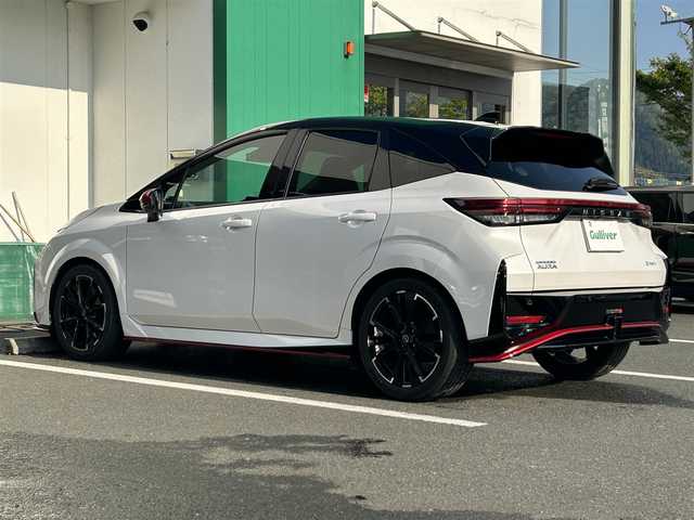日産 オーラ ニスモ 京都府 2022(令4)年 2.8万km ピュアホワイトパール / スーパーブラック 2トーン ワンオーナー/純正HDDナビ/(フルセグTV/BT/AM/FM/Apple CarPlay/Android Auto)/ビルトインETC/オートクルーズコントロール/プロパイロット/nismo　エアロ　フルパーツ/nismo 純正フロアマット/純正ドライブレコーダー/GPSアンテナ内臓レーザー＆レーダー探知機/全方位カメラ/アイドリングストップ/デジタルインナーミラー/コーナーセンサー/置くだけ充電/ハンドルヒーター