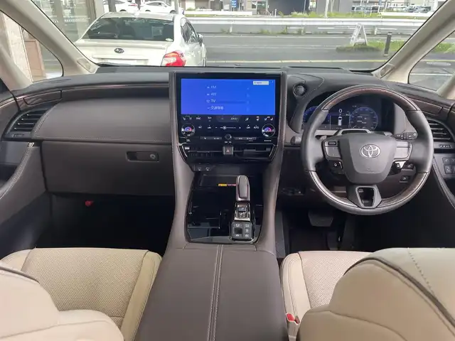 トヨタ アルファードハイブリット エグゼクティブ ラウンジ 宮城県 2023(令5)年 0.3万km プラチナホワイトパールマイカ ワンオーナー/純正メーカーディスプレイオーディオナビ（AM:FM:BT:TV）/デジタルインナーミラー/ヘッドアップディスプレイ/置くだけ充電/レーダークルコン/レーンキープアシスト/オートハイビーム/JBLプレミアムサウンド/ブレーキホールド/パドルシフト/D/N後席　パワーシート　エアーシート/シートヒーター/D席シートメモリー/パワーバックドア/BSM/ETC2.0/純正フリップダウンモニター/100V コンセント/オートハイビーム/アドバンストパーク/スマートキーx2