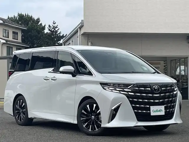 トヨタ アルファードハイブリット エグゼクティブ ラウンジ 宮城県 2023(令5)年 0.3万km プラチナホワイトパールマイカ ワンオーナー/純正メーカーディスプレイオーディオナビ（AM:FM:BT:TV）/デジタルインナーミラー/ヘッドアップディスプレイ/置くだけ充電/レーダークルコン/レーンキープアシスト/オートハイビーム/JBLプレミアムサウンド/ブレーキホールド/パドルシフト/D/N後席　パワーシート　エアーシート/シートヒーター/D席シートメモリー/パワーバックドア/BSM/ETC2.0/純正フリップダウンモニター/100V コンセント/オートハイビーム/アドバンストパーク/スマートキーx2