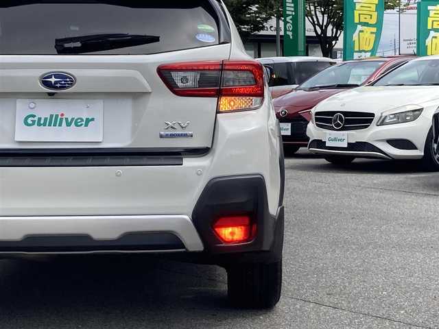 スバル ＸＶ ハイブリッド アドバンス 鳥取県 2020(令2)年 7.5万km クリスタルホワイトP 登録時走行距離：74284km/純正8型ナビ/　CD DVD BT フルセグTV/ダイアトーンサウンド/バックカメラ/左前カメラ/アイサイト/レーダークルーズコントロール/レーンキープアシスト/ブラインドスポットモニター/クリアランスソナー/LEDヘッドライト/オートライト/フォグランプ/リアフォグ/オートホールド機能付き電子パーキングブレーキ/MTモード付AT/パドルシフト/アルミペダル/ブラックレザーシート/パワーシート/シートヒーター/ETC2.0/革巻きステアリング/ステアリングスイッチ/プッシュスタート/スマートキー/スペアキー