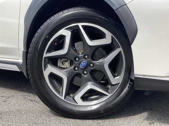スバル ＸＶ ハイブリッド アドバンス 鳥取県 2020(令2)年 7.5万km クリスタルホワイトP 登録時走行距離：74284km/純正8型ナビ/　CD DVD BT フルセグTV/ダイアトーンサウンド/バックカメラ/左前カメラ/アイサイト/レーダークルーズコントロール/レーンキープアシスト/ブラインドスポットモニター/クリアランスソナー/LEDヘッドライト/オートライト/フォグランプ/リアフォグ/オートホールド機能付き電子パーキングブレーキ/MTモード付AT/パドルシフト/アルミペダル/ブラックレザーシート/パワーシート/シートヒーター/ETC2.0/革巻きステアリング/ステアリングスイッチ/プッシュスタート/スマートキー/スペアキー