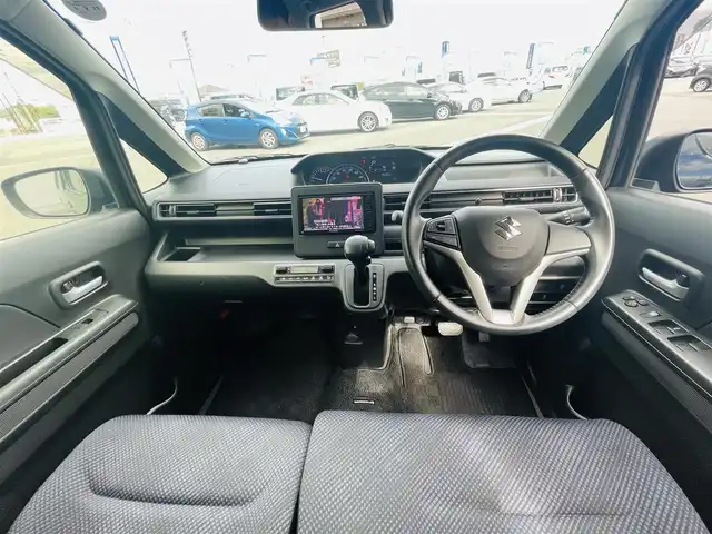 スズキ ワゴンＲ HYBRID FZ 岡山県 2017(平29)年 9.7万km ブルーイッシュブラックパール3 (株)IDOMが運営する【じしゃロン岡山店】の自社ローン専用車両になります。こちらは現金またはオートローンご利用時の価格です。自社ローンご希望の方は別途その旨お申付け下さい/スマートキー/プッシュスタート/社外7インチナビ/Bluetooth/バックカメラ/オートライト/純正14インチAW/純正フロアマット