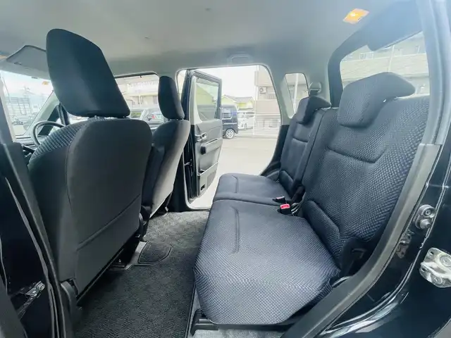 スズキ ワゴンＲ HYBRID FZ 岡山県 2017(平29)年 9.7万km ブルーイッシュブラックパール3 (株)IDOMが運営する【じしゃロン岡山店】の自社ローン専用車両になります。こちらは現金またはオートローンご利用時の価格です。自社ローンご希望の方は別途その旨お申付け下さい/スマートキー/プッシュスタート/社外7インチナビ/Bluetooth/バックカメラ/オートライト/純正14インチAW/純正フロアマット