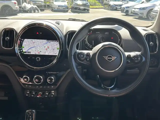 ＭＩＮＩ ＢＭＷ ミニ クロスオーバー クーパー D オール4 エッセンシャルトリム 高知県 2021(令3)年 3万km 紺Ⅱ 純正ナビ/【AM/FM/BT】/ぺッパーパッケージ/・電動リアゲート/・バックカメラ/・スマートキー/インテリジェントセーフティ/・追突警告　/・歩行者警告　/・車線逸脱警告/シートヒーター/純正17インチAW/LEDヘッドライト/クリアランスソナー/ACC/ミラー一体型ETC/ルーフレール/ドライブレコーダー360°/シートカバー(茶色)/純正フロアマット/４WD