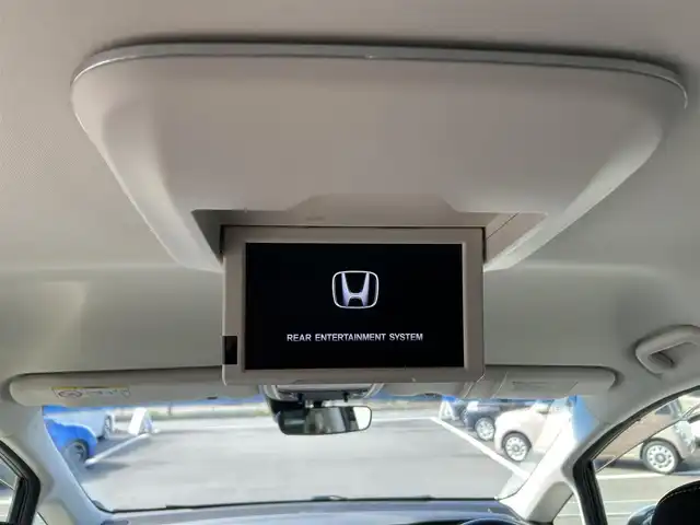 ホンダ オデッセイ アブソルート 愛媛県 2014(平26)年 6.3万km ホワイトオーキッドパール 純正ナビ/全周囲カメラ/両側パワースライドドア/純正フリップダウンモニター/HDMI入力端子/USB入力端子/パドルシフト/クルーズコントロール/LEDヘッドライト/オートライト/電格ミラー/ヒートミラー/ETC/アイドリングストップ/ドアバイザー/無限フロアマット/純正18インチAW(社外センターキャップ)/現状サマー(社外AW)(225/45/ZR18)/MINERVA RADIAL F205