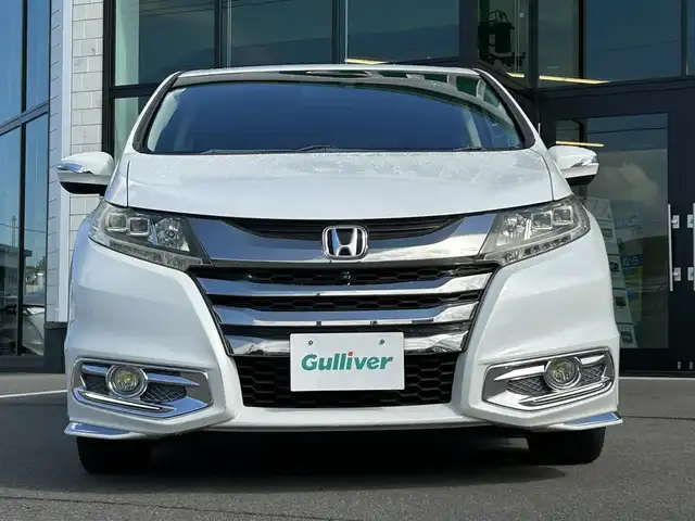ホンダ オデッセイ アブソルート 愛媛県 2014(平26)年 6.3万km ホワイトオーキッドパール 純正ナビ/全周囲カメラ/両側パワースライドドア/純正フリップダウンモニター/HDMI入力端子/USB入力端子/パドルシフト/クルーズコントロール/LEDヘッドライト/オートライト/電格ミラー/ヒートミラー/ETC/アイドリングストップ/ドアバイザー/無限フロアマット/純正18インチAW(社外センターキャップ)/現状サマー(社外AW)(225/45/ZR18)/MINERVA RADIAL F205