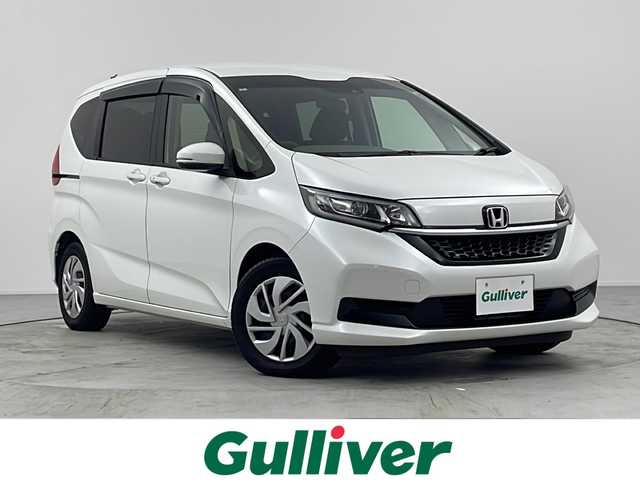 ホンダ フリード G 愛知県 2023(令5)年 2.5万km プラチナホワイトパール /禁煙車//純正ナビ//AM/FM/CD/DVD/ipod//SD/USB/BT/AUX/フルセグ//前席シートヒーター//両側パワースライドドア//ビルトインETC//バックカメラ//LEDオートライト/アクティブコーナリングライト//オートハイビーム//ホンダセンシング//CMBS//ACC//LKAS//アイドリングストップ//横滑り防止装置//プッシュスタート//純正フロアマット//純正ドアバイザー//サイドシェード//ISOFIX//ECON//スマートキー