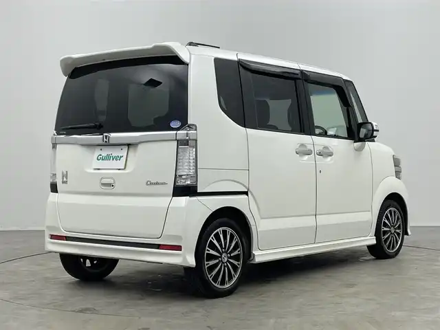 ホンダ Ｎ ＢＯＸ カスタム G ターボパッケージ 埼玉県 2013(平25)年 9.5万km タフタホワイトⅢ 純正7インチナビ/ フルセグTV Bluetooth CD DVD iPod/バックカメラ/両側パワースライドドア/クルーズコントロール/パドルシフト/ETC/純正フロアマット/純正15インチアルミホイール/オートライト/スマートキー/プッシュスタート/電動格納ミラー