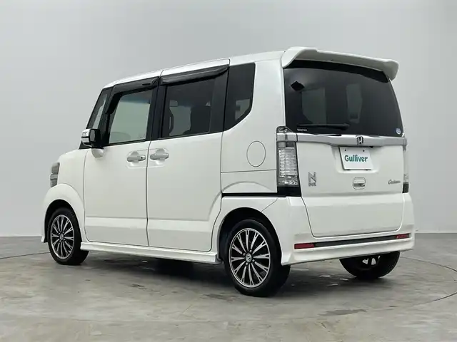ホンダ Ｎ ＢＯＸ カスタム G ターボパッケージ 埼玉県 2013(平25)年 9.5万km タフタホワイトⅢ 純正7インチナビ/ フルセグTV Bluetooth CD DVD iPod/バックカメラ/両側パワースライドドア/クルーズコントロール/パドルシフト/ETC/純正フロアマット/純正15インチアルミホイール/オートライト/スマートキー/プッシュスタート/電動格納ミラー