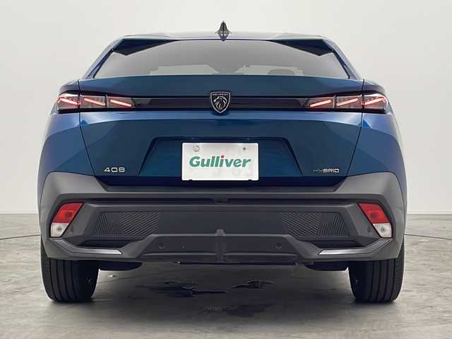 プジョー プジョー ４０８ GT ハイブリッド 三重県 2023(令5)年 3.9万km 青 禁煙車/純正ナビ（Bluetooth・AppleCarPlay・AndroidAuto）/アラウンドビューモニター/ブラインドスポットモニター/デジタルインナーミラー/パドルシフト/前席シートヒーター/前席パワーシート/パワーバックドア/電動パーキング/レーダークルーズコントロール/革巻きステアリング/ビルトインETC/置くだけ充電/LEDヘッドライト（オートライト）