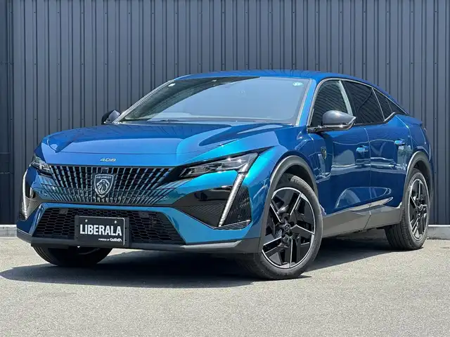 プジョー プジョー ４０８ GT ハイブリッド 福島県 2023(令5)年 3.9万km 青Ｍ ワンオーナー/ACC/レーンキープ/ブラインドスポット/ハーフレザーシート/前席シートヒーター/前席パワーシート/ステアリングヒーター/純正ナビ/・Bluetooth・AppleCarPlay・AndroidAuto/360°カメラ/デジタルインナーミラー型ドラレコ/パドルシフト/パワーバックドア/ETC/ワイヤレス充電/LEDヘッドライト/アンビエントライト/ドライブモード/取扱説明書/保証書/スペアキー