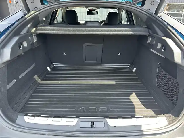 プジョー プジョー ４０８ GT ハイブリッド 福島県 2023(令5)年 3.9万km 青Ｍ ワンオーナー/ACC/レーンキープ/ブラインドスポット/ハーフレザーシート/前席シートヒーター/前席パワーシート/ステアリングヒーター/純正ナビ/・Bluetooth・AppleCarPlay・AndroidAuto/360°カメラ/デジタルインナーミラー型ドラレコ/パドルシフト/パワーバックドア/ETC/ワイヤレス充電/LEDヘッドライト/アンビエントライト/ドライブモード/取扱説明書/保証書/スペアキー