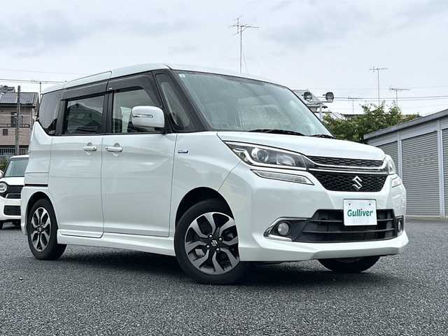 スズキ ソリオ バンディット HV MV 東京都 2017(平29)年 1.3万km ピュアホワイトP ワンオーナー/アイドリングストップ/横滑り防止機能/SUZUKI純正8インチナビ/【フルセグ・Bluetooth】/両側パワースライドドア/シートヒーター（運転席）/純正フロアマット/ウォークスルー/ドアバイザー/サンシェード/保証書/取説