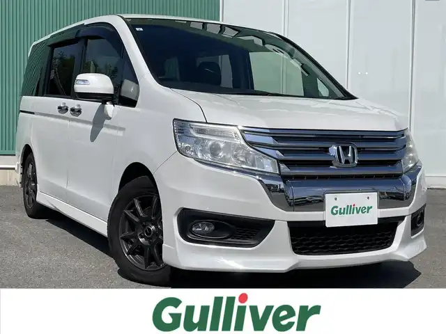 ホンダ ステップワゴン スパーダ Z 福岡県 2014(平26)年 9万km ホワイトオーキッドパール 社外7型ナビ（（ワンセグ/DISC/AM/FM/SD/iPod)/Bカメラ/両側パワースライドドア/クルーズコントロール/LEDヘッドライト/オートライト/社外16インチAW/アイドリングストップ/パドルシフト/横滑り防止装置/盗難防止装置/ドアバイザー/純正フロアマット/スマートキー/ETC/保証書/取扱説明書