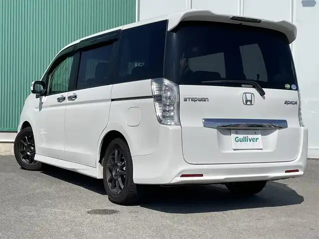ホンダ ステップワゴン スパーダ Z 福岡県 2014(平26)年 9万km ホワイトオーキッドパール 社外7型ナビ（（ワンセグ/DISC/AM/FM/SD/iPod)/Bカメラ/両側パワースライドドア/クルーズコントロール/LEDヘッドライト/オートライト/社外16インチAW/アイドリングストップ/パドルシフト/横滑り防止装置/盗難防止装置/ドアバイザー/純正フロアマット/スマートキー/ETC/保証書/取扱説明書